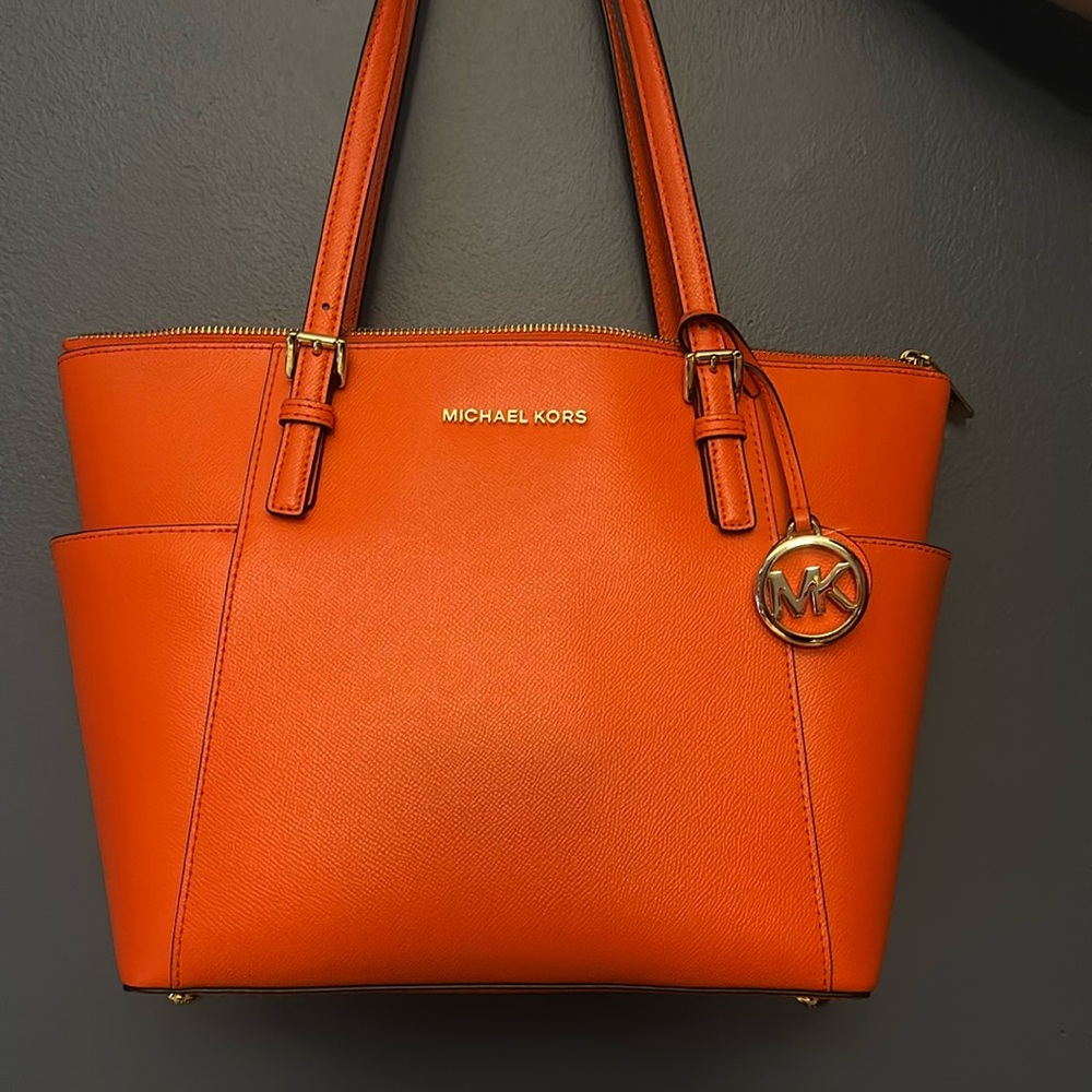 Micheal Kors orange and gold tote purse